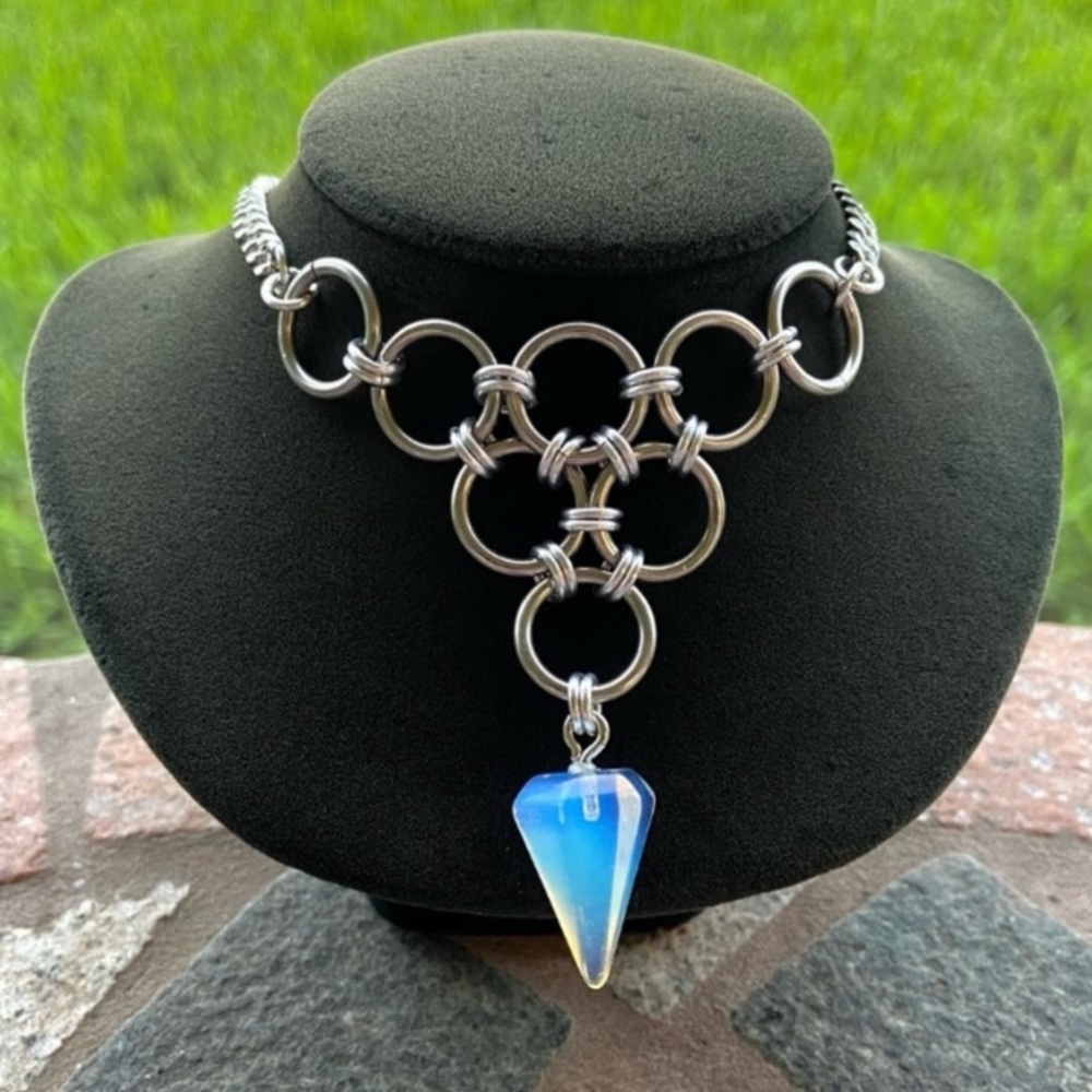 Handmade maille steel choker necklace with iridescent opalite pendulum charm .